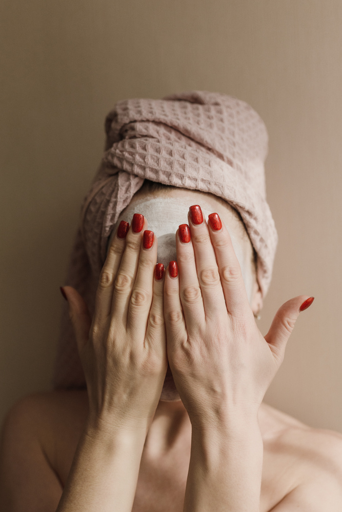 A Woman Covering Her Face